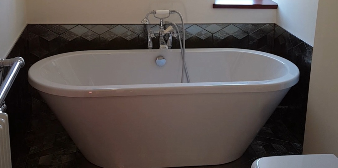 Intricate tile work in a residential space demonstrating SBR Property Services' expert tiling services